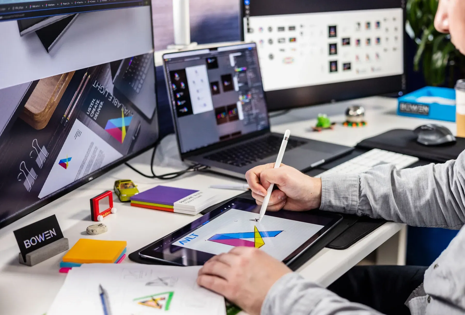 A Graphic Designer Creating a Brand Identity on a Tablet